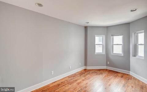 empty room with light wood-type flooring