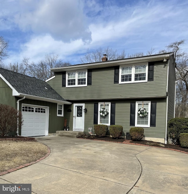 view of front of property featuring a garage