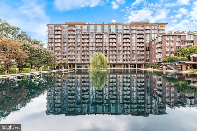 view of building exterior with a water view