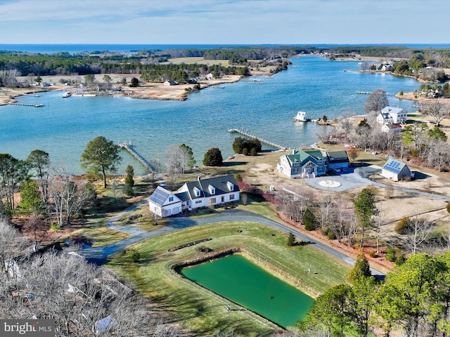 birds eye view of property featuring a water view