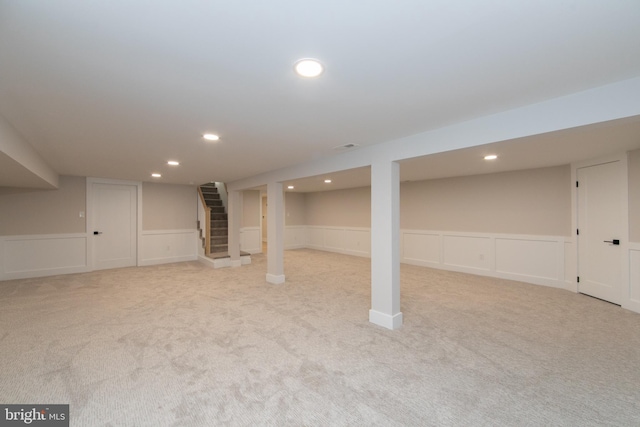 basement with light carpet