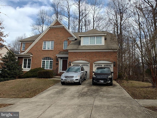 view of property with a garage and a front lawn