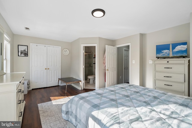 bedroom with dark hardwood / wood-style floors, connected bathroom, and a closet