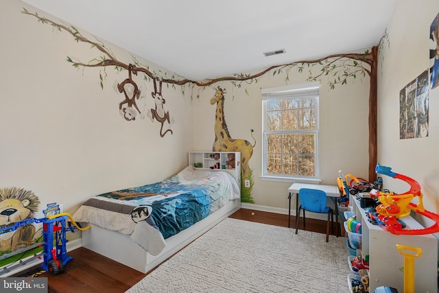 bedroom featuring hardwood / wood-style flooring