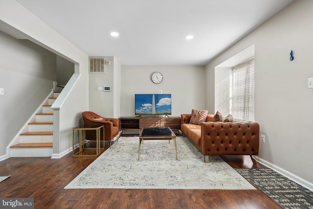 living room featuring dark hardwood / wood-style floors