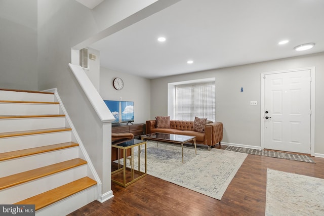 living room with dark wood-type flooring