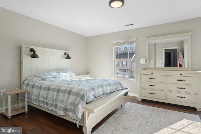 bedroom featuring hardwood / wood-style flooring