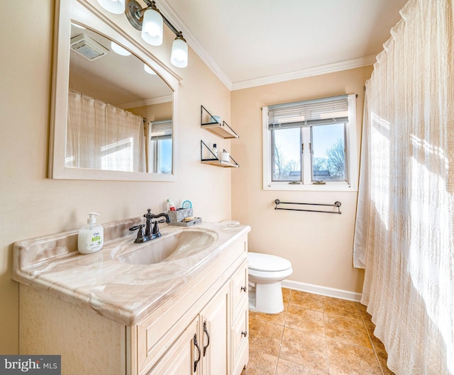 bathroom featuring crown molding, vanity, tile patterned floors, and toilet