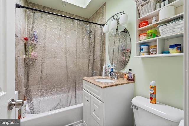 full bathroom featuring shower / tub combo, vanity, a skylight, and toilet