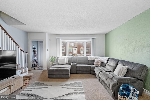 living room with a textured ceiling