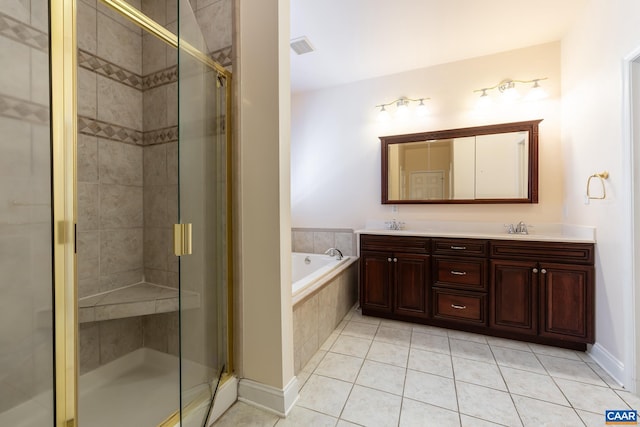 bathroom with vanity, independent shower and bath, and tile patterned flooring