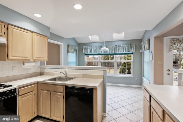 kitchen with sink, dishwasher, range, light brown cabinetry, and decorative backsplash