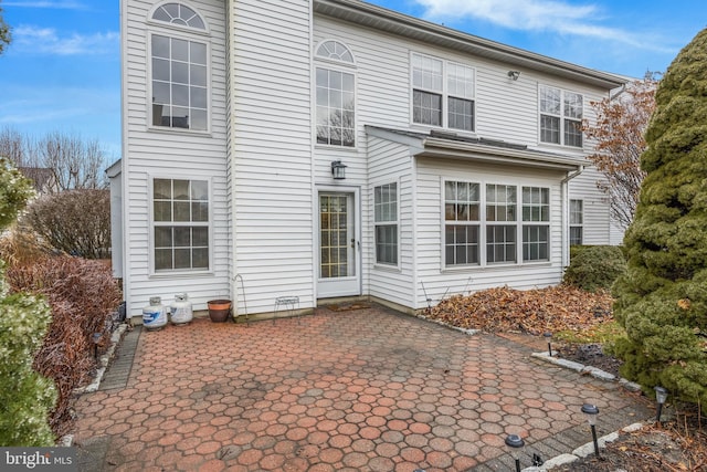 back of house featuring a patio area