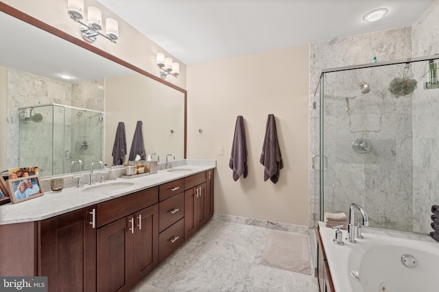 bathroom featuring vanity and separate shower and tub