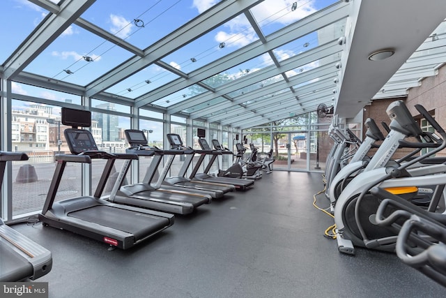 exercise room with a wealth of natural light and floor to ceiling windows