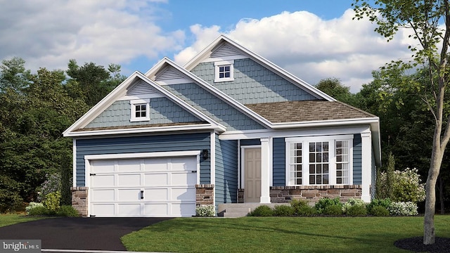 craftsman house with a garage and a front yard