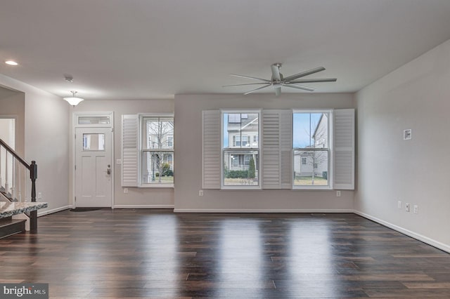 foyer with dark wood-type flooring and ceiling fan