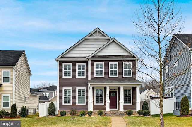 view of front of home with a front yard