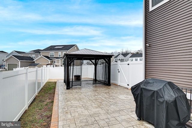 view of patio with a gazebo and area for grilling