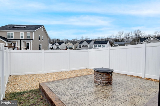 view of patio featuring a fire pit