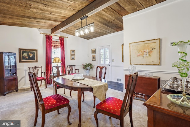 dining space featuring vaulted ceiling with beams, wooden ceiling, visible vents, and carpet