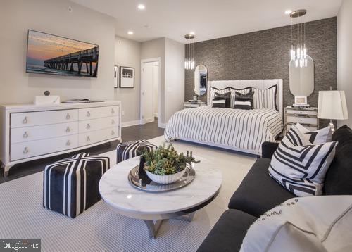 bedroom featuring hardwood / wood-style flooring