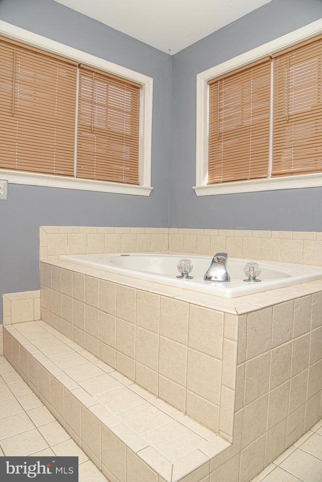 bathroom with tile patterned floors