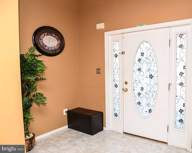 view of tiled foyer entrance