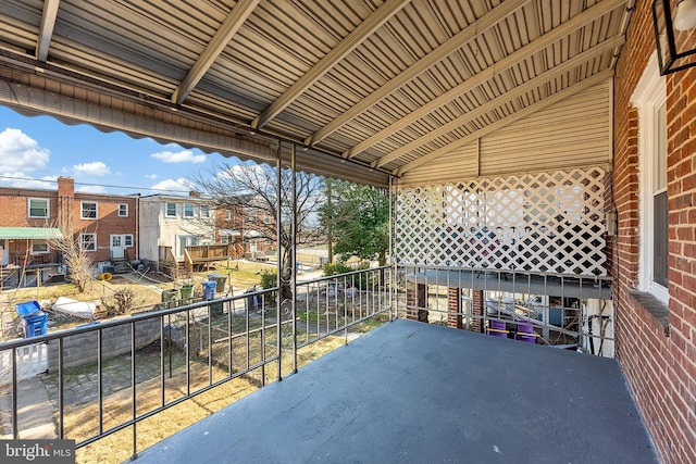 view of patio featuring a balcony