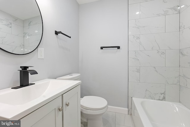 full bathroom featuring vanity, tiled shower / bath, and toilet