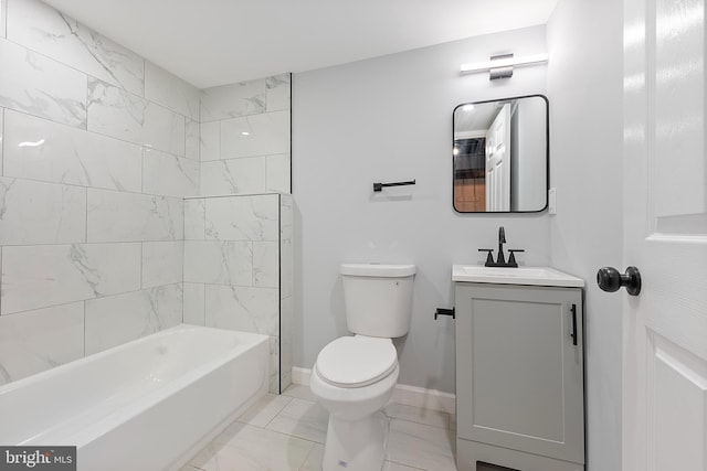 full bathroom with vanity, toilet, and tiled shower / bath combo