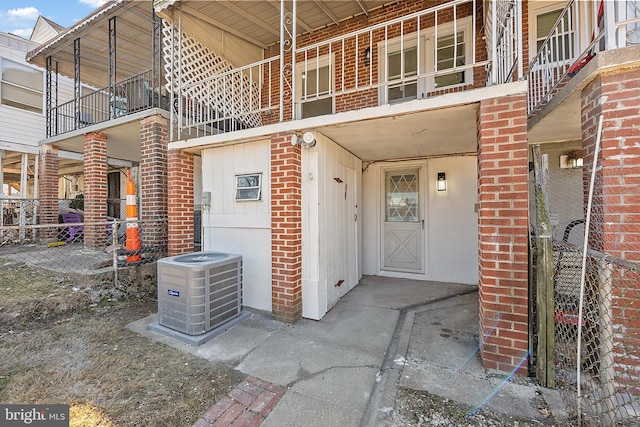 doorway to property with central AC unit