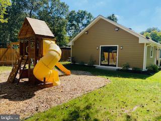 view of jungle gym with a yard