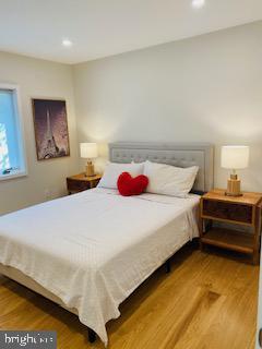 bedroom featuring hardwood / wood-style flooring