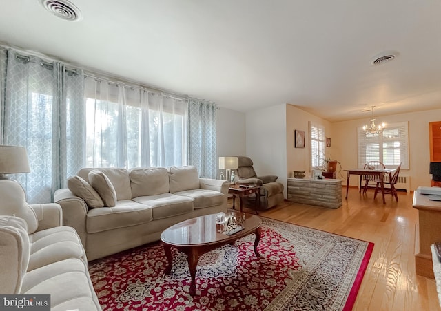 5425 Indian Head Hwy, Indian Head, MD 20640 - living room with a chandelier and light wood-type flooring