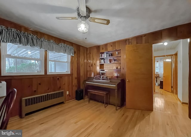 5425 Indian Head Hwy, Indian Head, MD 20640 - misc room with ceiling fan, radiator, light hardwood / wood-style floors, and wood walls