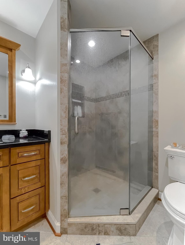 5425 Indian Head Hwy, Indian Head, MD 20640 - bathroom featuring tile patterned flooring, vanity, toilet, and walk in shower