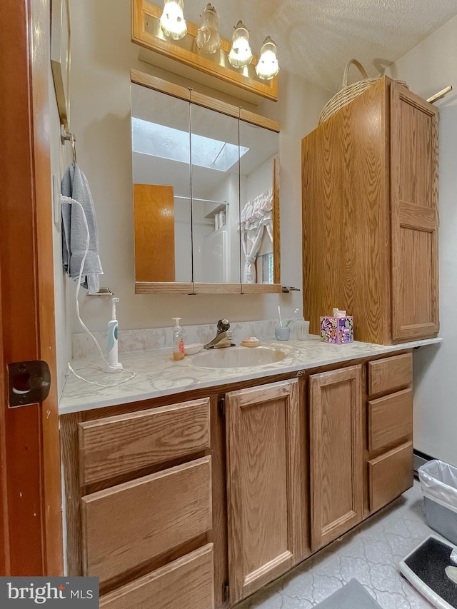 5425 Indian Head Hwy, Indian Head, MD 20640 - bathroom featuring vanity, a textured ceiling, and walk in shower