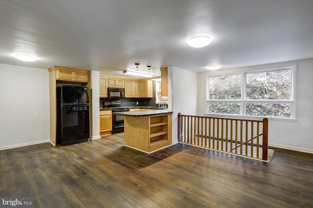 kitchen featuring dark wood-type flooring, light brown cabinetry, kitchen peninsula, and black appliances