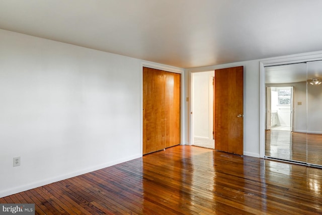 spare room featuring hardwood / wood-style flooring