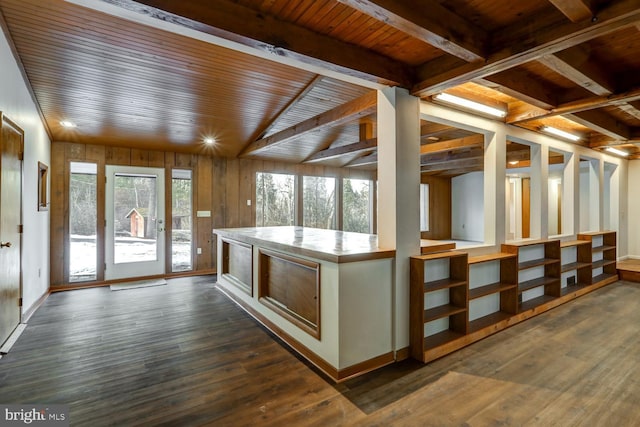 unfurnished sunroom with wood ceiling and beam ceiling