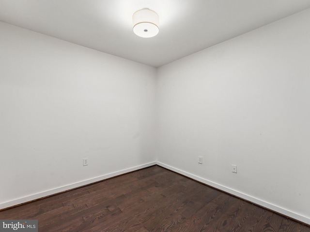 unfurnished room featuring hardwood / wood-style floors