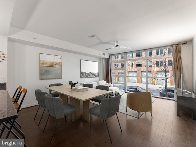 dining space with hardwood / wood-style flooring and ceiling fan