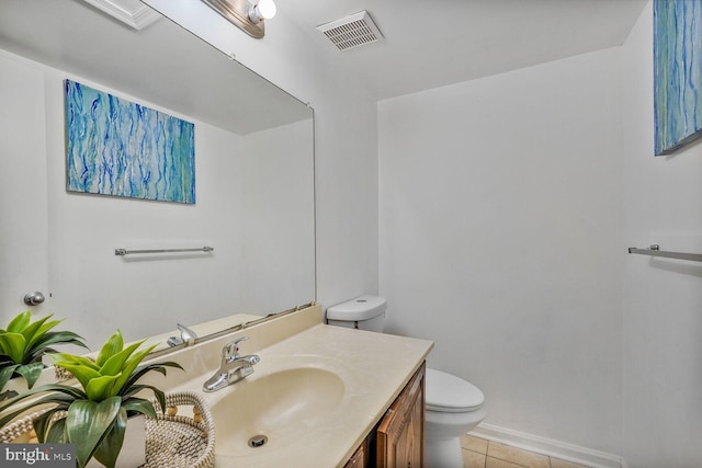 bathroom with visible vents, baseboards, toilet, tile patterned floors, and vanity