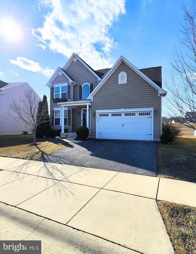 front of property featuring a garage