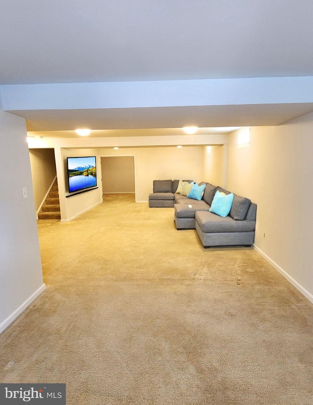 unfurnished living room featuring light colored carpet