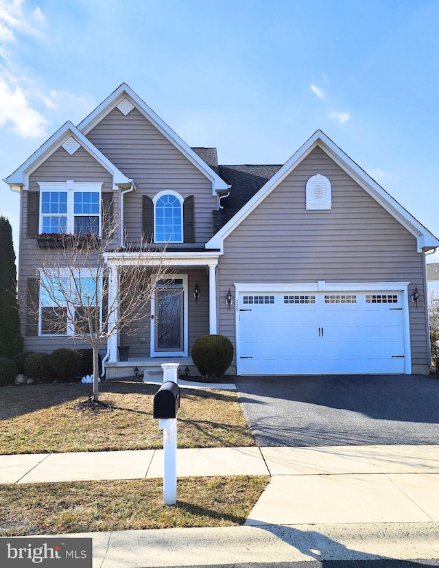 front of property featuring a garage