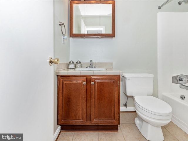 full bathroom featuring tile patterned flooring, tub / shower combination, vanity, and toilet