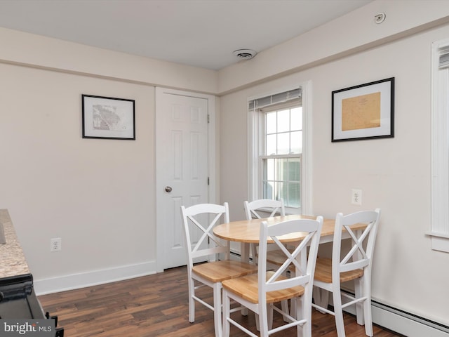 dining room featuring dark hardwood / wood-style floors