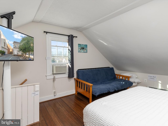 bedroom with vaulted ceiling, dark wood-type flooring, and cooling unit